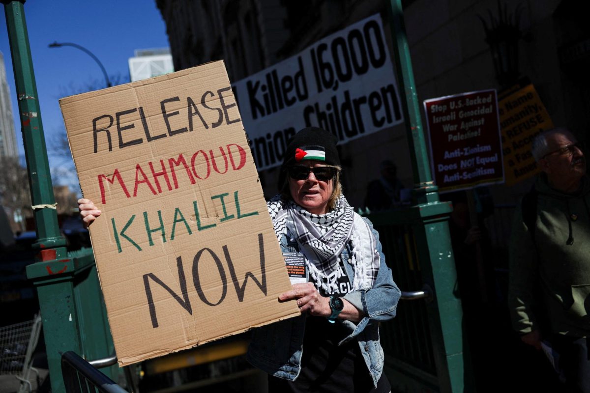 A person holds a sign during a protest following the arrest by U.S. immigration agents of Palestinian student protester Mahmoud Khalil at Columbia University, in New York City, U.S., March 10, 2025. REUTERS/Shannon Stapleton