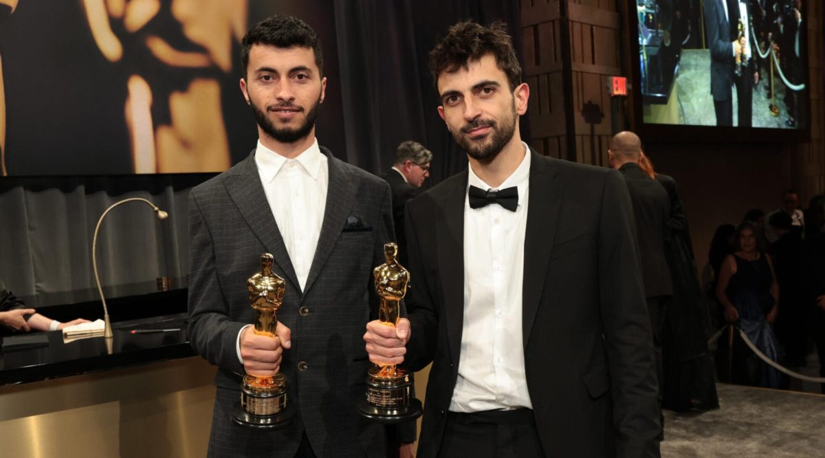 Basel Adra, left, and Yuval Abraham, winners of the best documentary feature award for "No Other Land," attend the 97th Annual Oscars Governors Ball on March 2, 2025, in Hollywood.  (Photo by Monica Schipper/Getty Images)