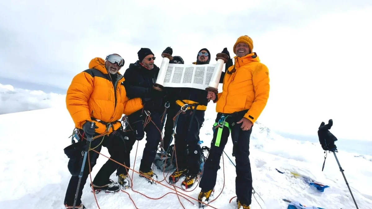 Minyan Everest climbers with their Torah scroll atop Mera Peak in northeastern Nepal, May 6, 2025. Credit: Minyan Everest.