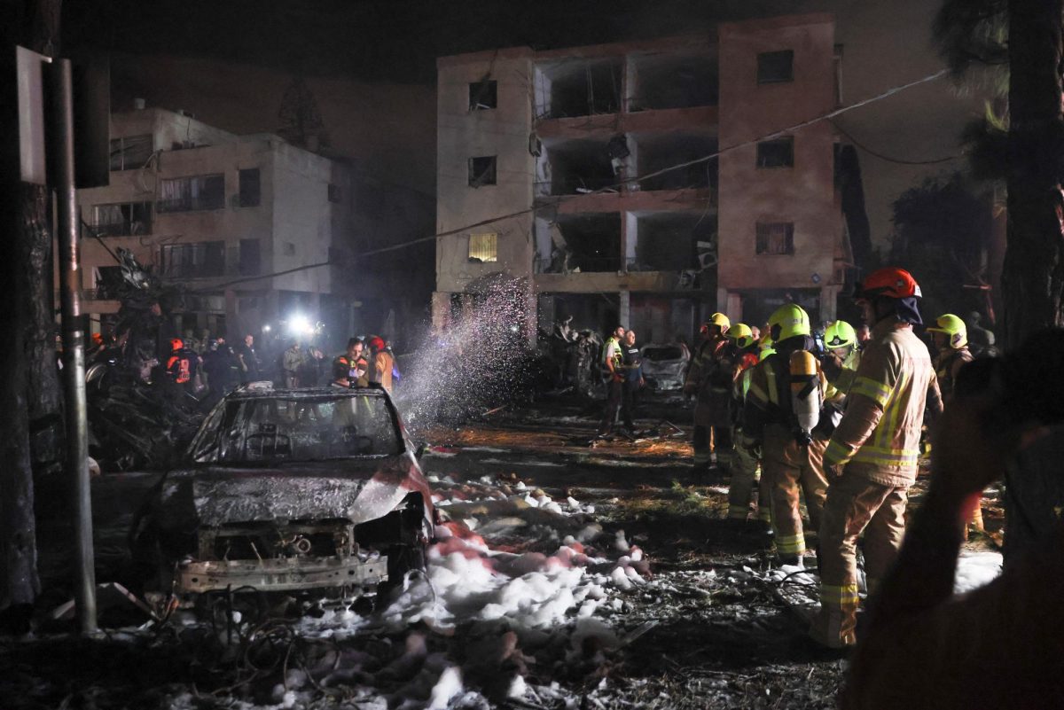 Emergency personnel operate after missiles were launched from Iran to Israel, in Haifa, Israel, June 15, 2025. REUTERS/Shir Torem