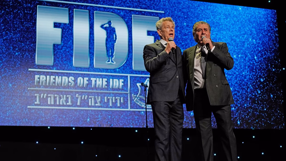Record producer David Foster, left, and entertainment executive Haim Saban speak onstage at Friends of The Israel Defense Forces Western Region Gala at The Beverly Hilton Hotel in Beverly Hills, Calif. on Nov. 1, 2018. (Shahar Azran/Getty Images)