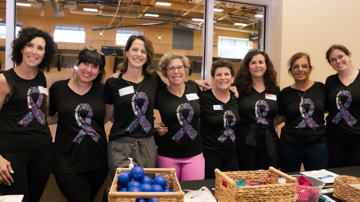 Debbi Braunstein (fourth from right) of the J’s Hamsa Wellness Community, pictured with members of the committee for the Beyond Pink program. 