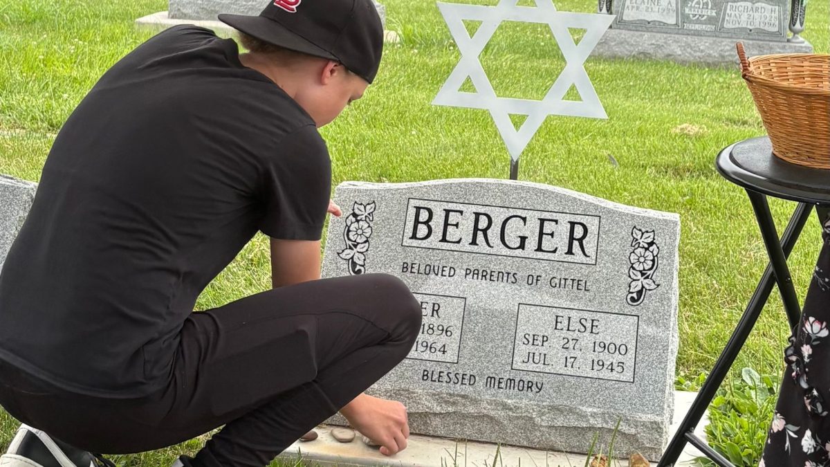 Stones are laid at the monument for Walter and Else Berger.