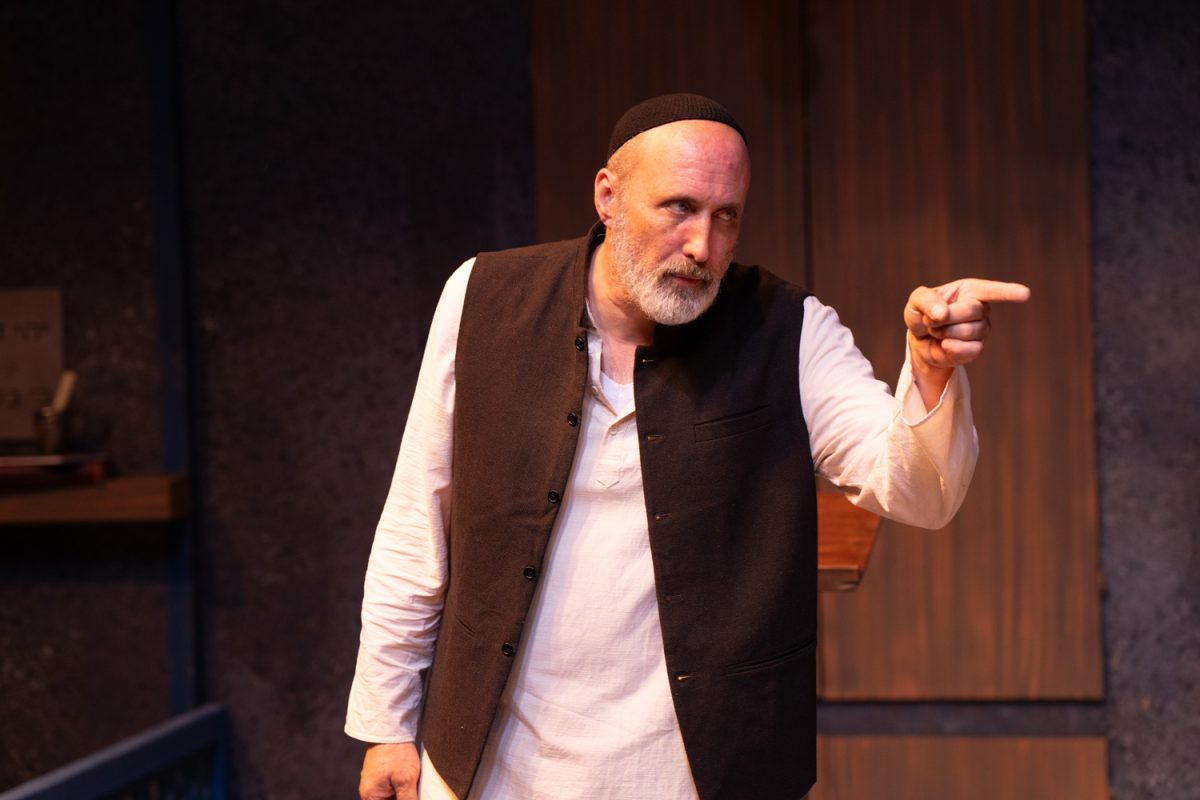 Chuck Winning as Zeblyan in ‘Two Jews Walk Into a War...’ Photo: Jon Gitchoff