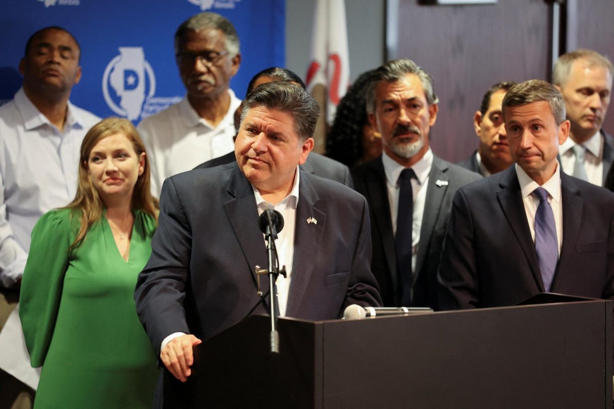Illinois Governor JB Pritzker attends a news conference held by Texas Democratic lawmakers after leaving the state to deny Republicans the quorum needed to redraw Texas' 38 congressional districts, in Aurora, Illinois, U.S. August 5, 2025.    REUTERS/Tom Krawczyk
