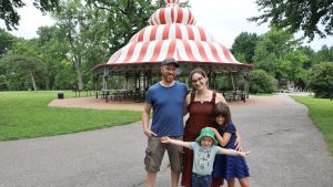 Adam Didier and Carly Ferdman with their two children in Tower Grove Park. The couple chose to live in the Shaw 
neighborhood. 