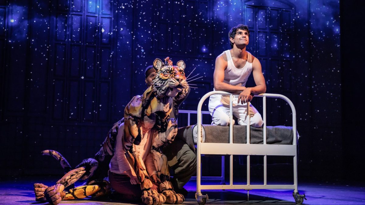 Taha Mandviwala as ‘Pi’ and puppeteers Anna Leigh Gortner, Shiloh Goodin and Toussaint Jeanlouis as ‘Richard Parker’ in the National Tour of ‘Life of Pi,’ which comes to the Fox Theatre in October.  Photo: Evan Zimmerman/MurphyMade