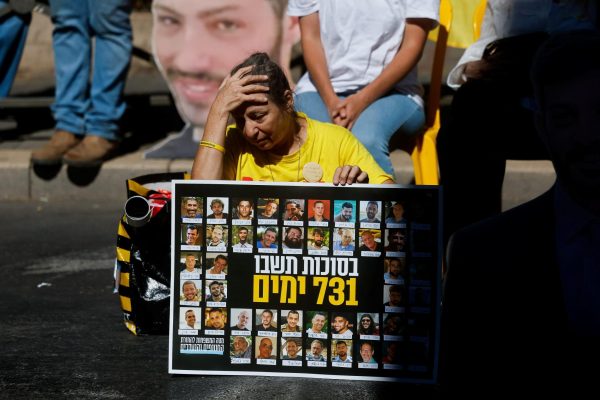 A woman reacts as families of Israeli hostages and supporters protest outside Israeli Prime Minister Benjamin Netanyahu's residence, marking the two-year anniversary of the deadly October 7, 2023 attack on Israel by Hamas from Gaza, in Jerusalem, October 7, 2025. REUTERS/Ammar Awad     TPX IMAGES OF THE DAY