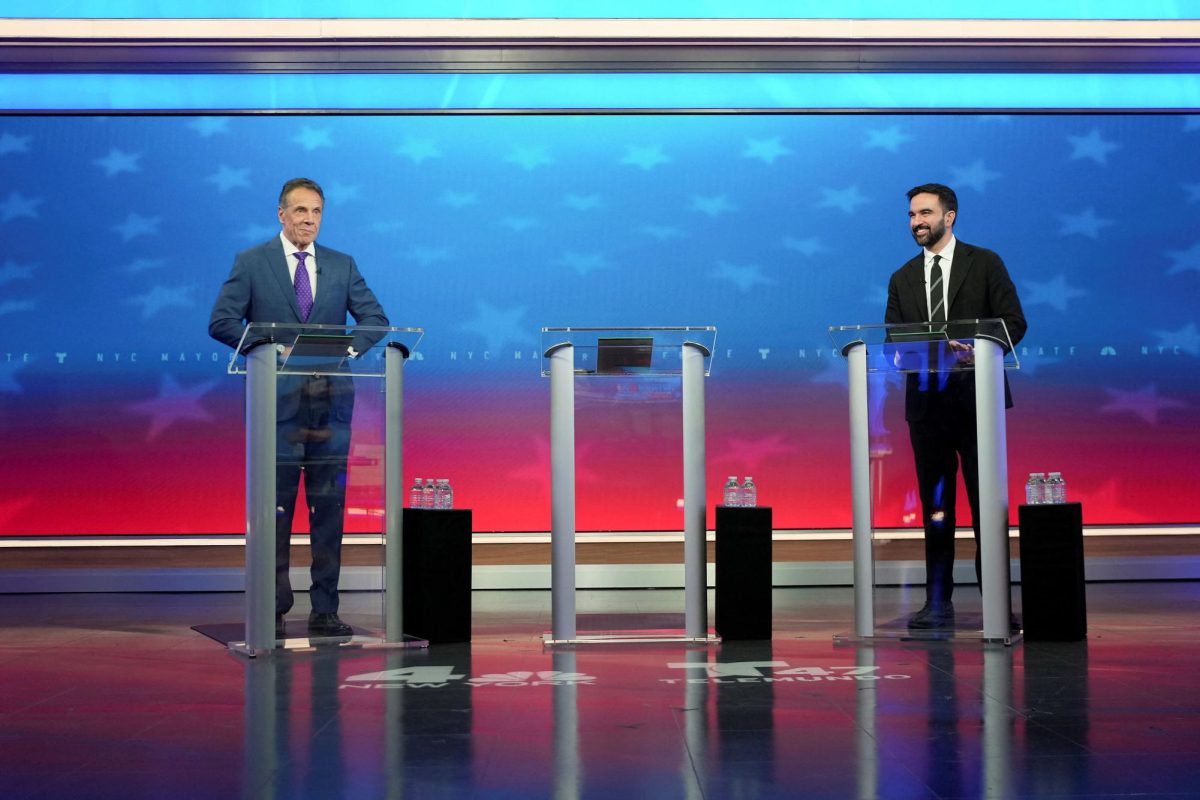Independent candidate and former New York Gov. Andrew Cuomo and Democratic candidate Zohran Mamdani prepare for a mayoral debate, in New York, U.S., October 16, 2025. Angelina Katsanis/Pool via REUTERS
