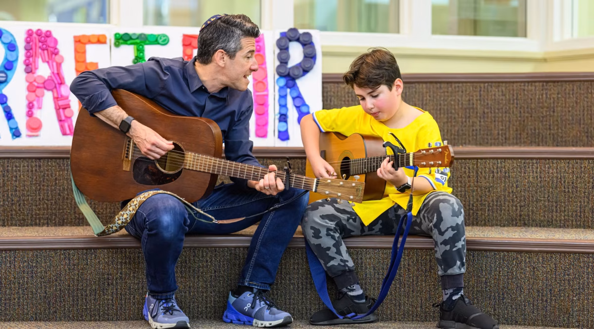 Oren Kaunfer, a spiritual educator at the Boston-area Jewish Community Day School, uses technology to get students to think creatively about their spiritual life and practices. (Adam Richins)
