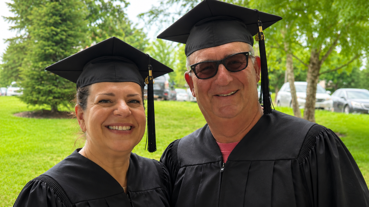 Amy Fenster Brown and Bill Motchan, celebrating their graduations from everything.