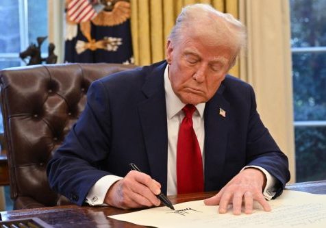 President Donald Trump signs an executive order in the Oval Office of the White House in Washington, DC, on Jan. 30, 2025. (Roberto Schmidt / AFP via Getty Images)