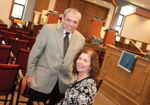 Judy and Dr. Robert Hellman outside Young Israel. 